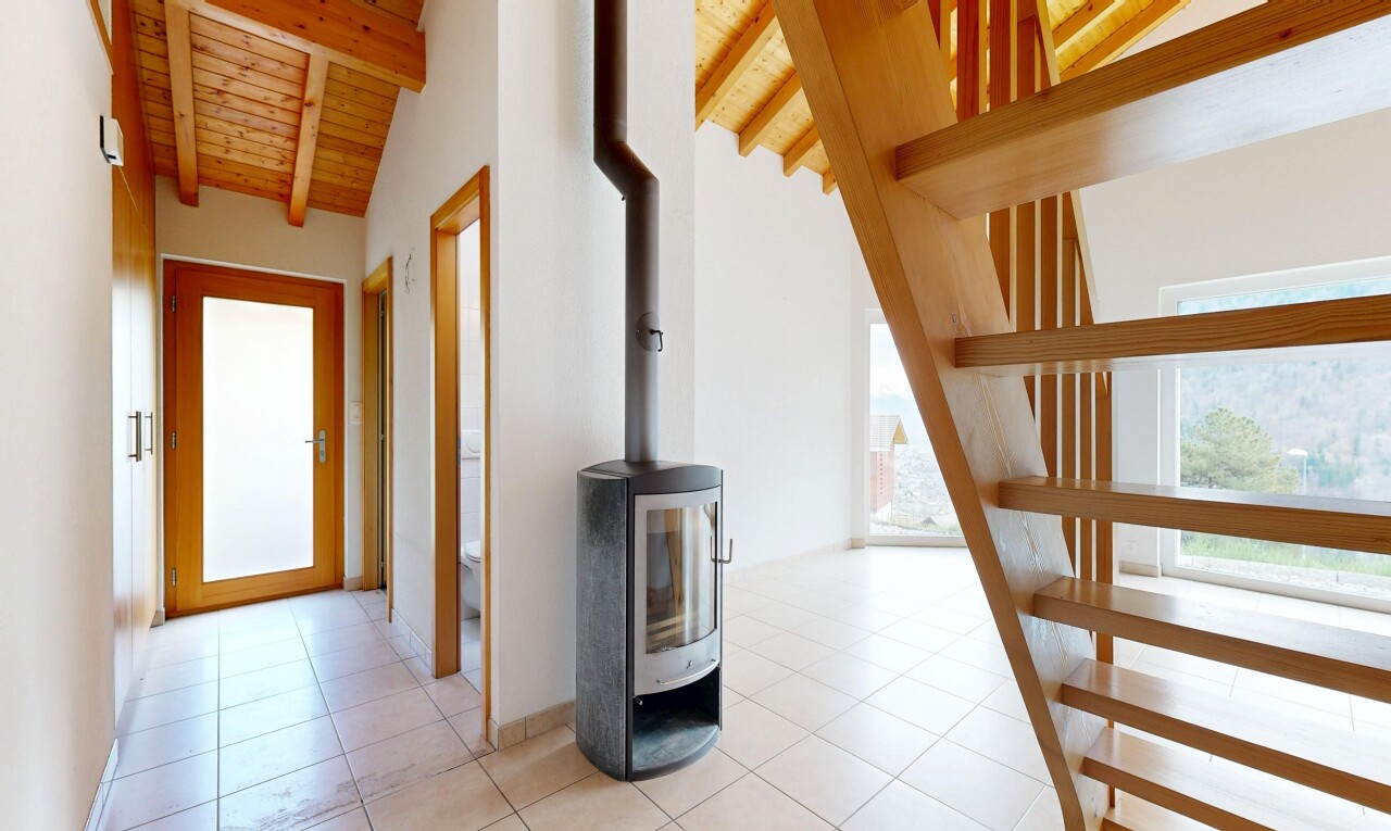 halle / korridor mit inside property, light floor, drywall, gipskartonwand, und natural light