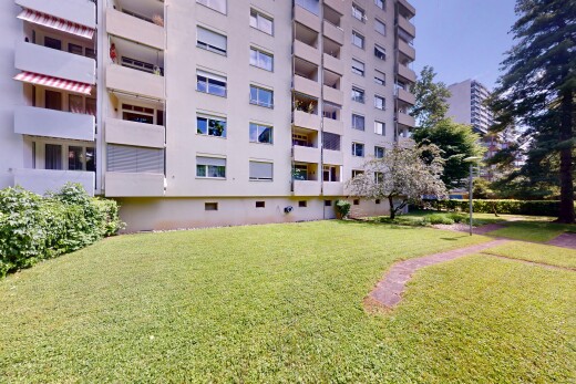 extérieur du bâtiment avec property visible, vue sur le complexe d'appartements, et apartment complex view