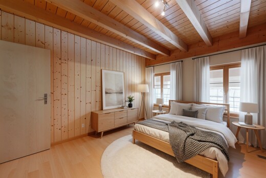 chambre avec wood finish floor, sol en finition bois, inside property, beamed ceiling, et plafond à poutres