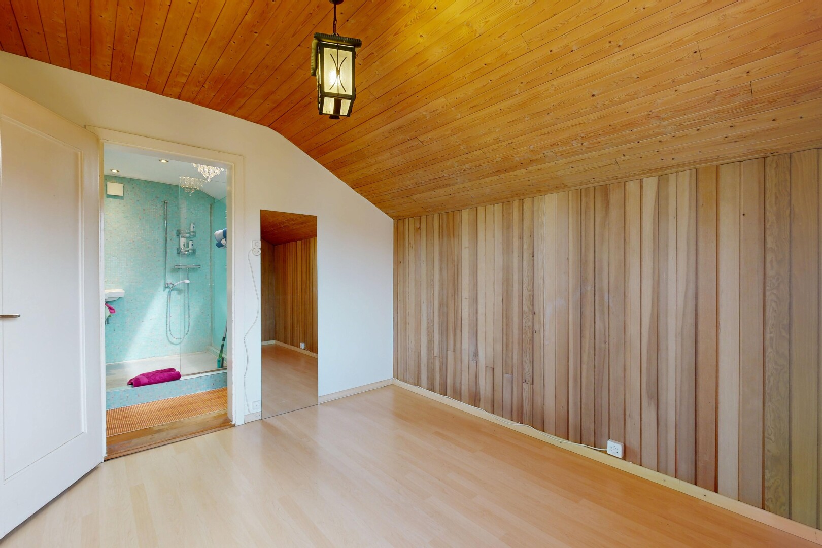 unfurnished room with light wood-type flooring and a vaulted wood ceiling