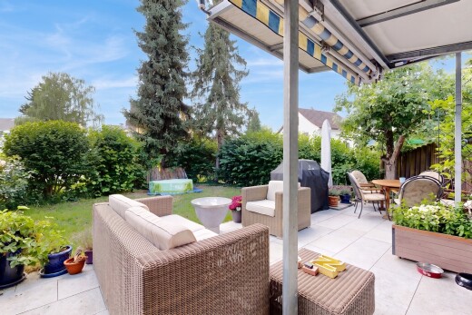 terrace featuring a patio area, an outdoor living / dining area, and grilling area