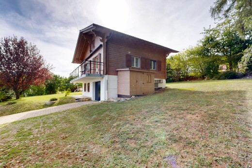 view of home with a lawn