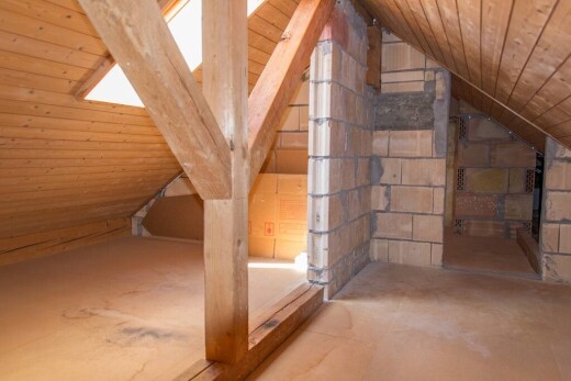 stairs with wooden ceiling