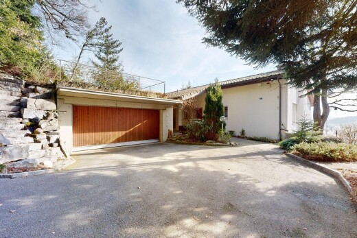 view of home with driveway