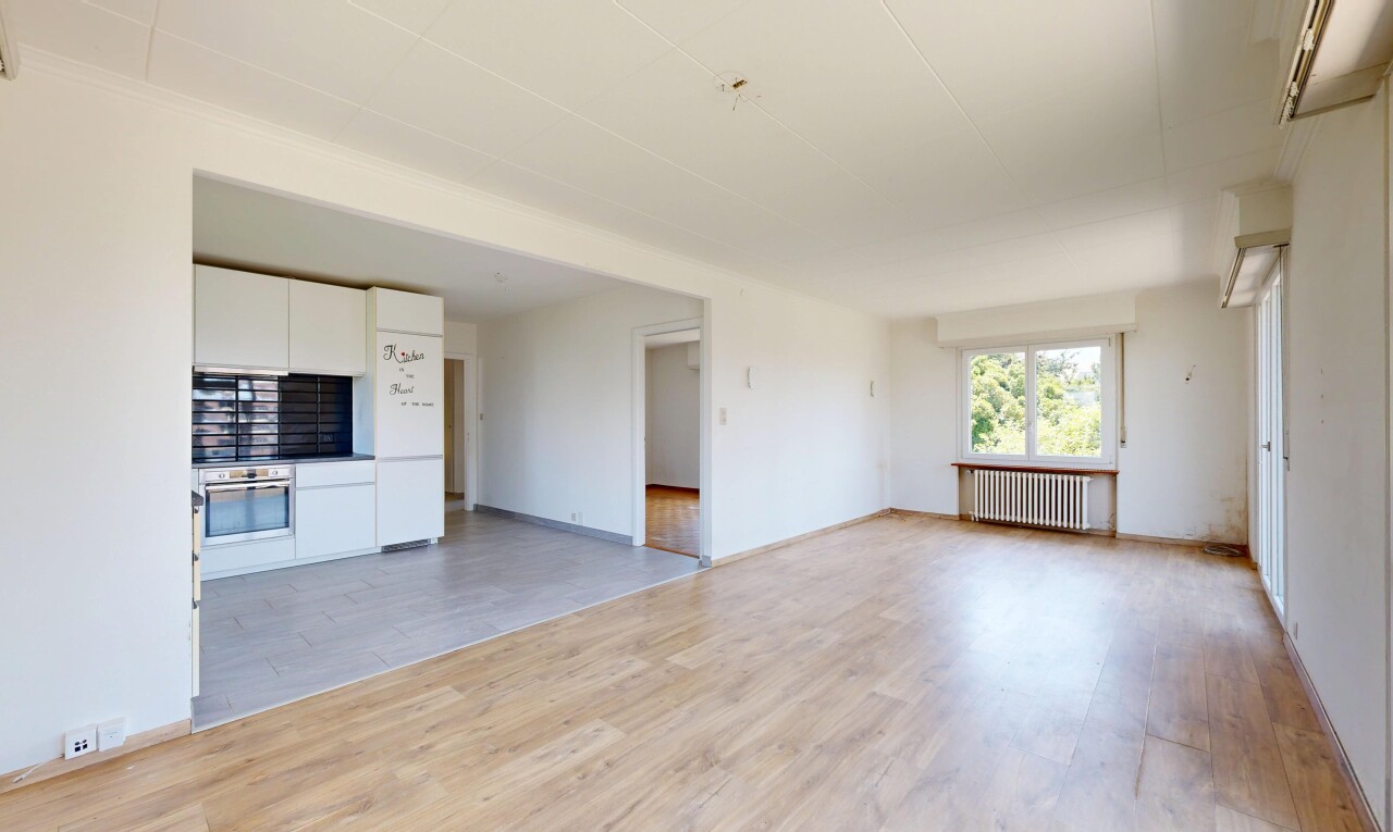leerer raum mit inside property, holzfußboden, wood finish floor, gipskartonwand, und drywall