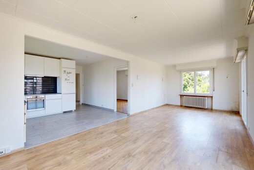 leerer raum mit inside property, holzfußboden, wood finish floor, gipskartonwand, und drywall