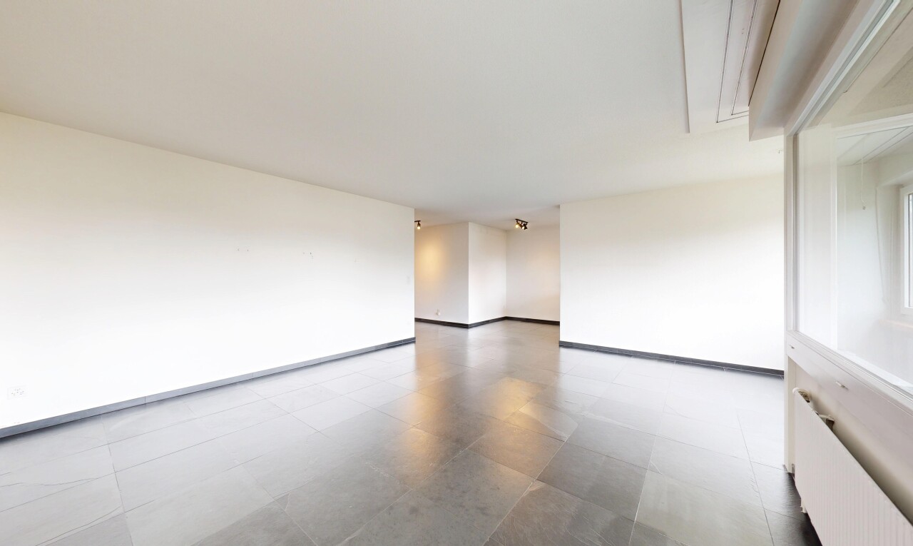 empty room with light floors and attic access