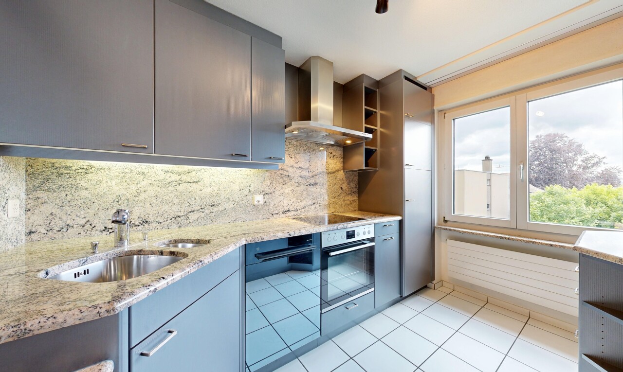 kitchen featuring open shelves, oven, decorative backsplash, light stone countertops, and light tile patterned floors