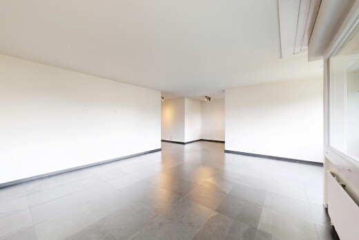 empty room with light floors and attic access