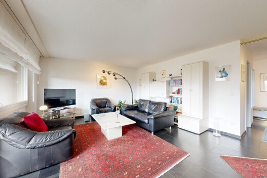 wohnzimmer mit inside property, fernseher, gipskartonwand, drywall, und natürliches licht