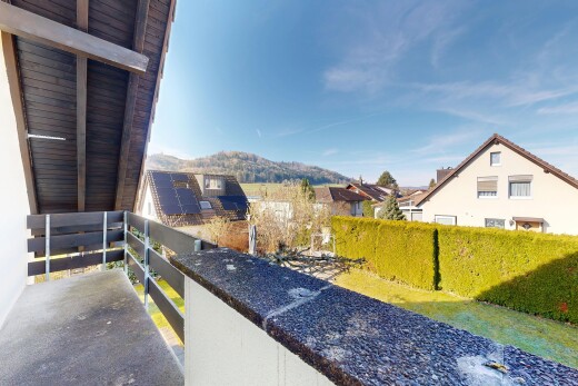 balcony with a mountain view and a residential view