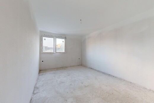 pièce vide avec inside property, drywall, cloison sèche, et lumière naturelle