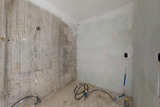pièce vide avec unfinished floor et inside property