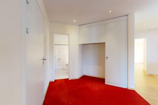 pièce vide avec drywall, cloison sèche, inside property, carpet, et moquette