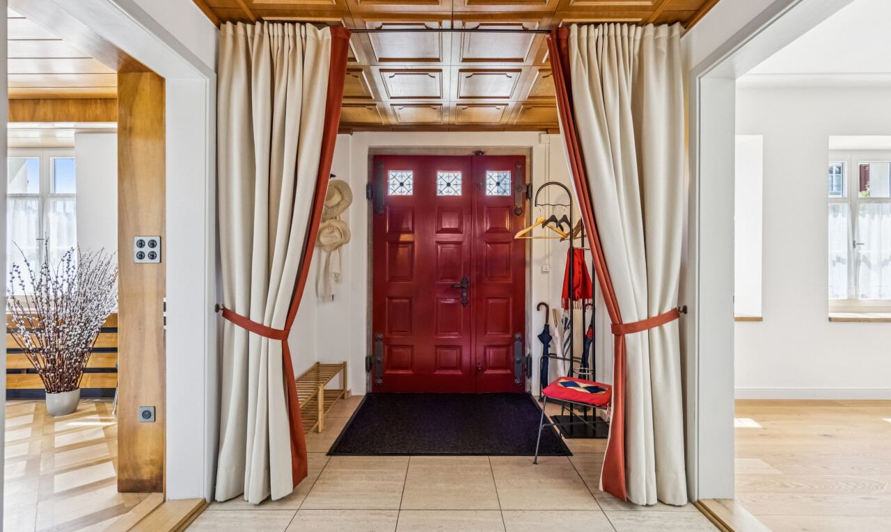 hallway with light tile patterned flooring