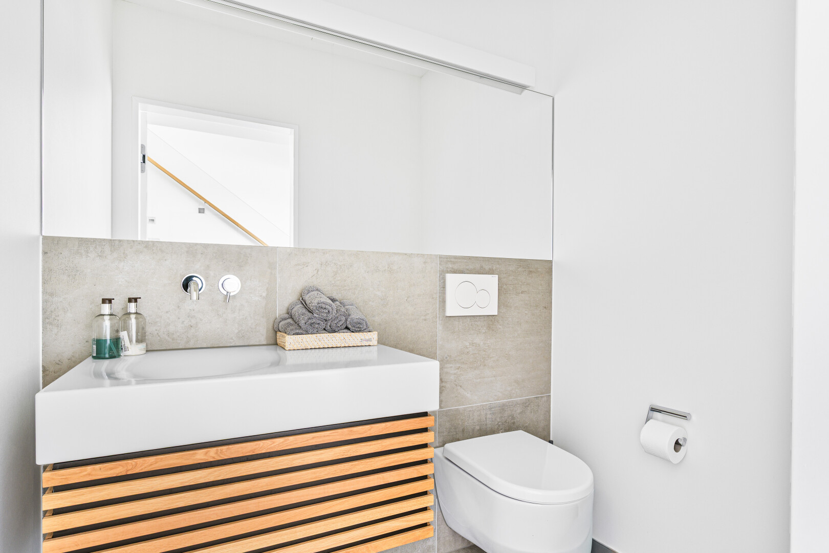 bathroom with tile walls and vanity