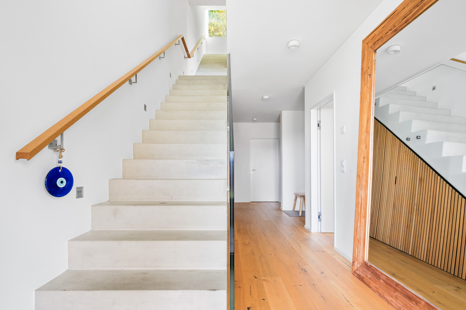 stairway featuring wood finished floors