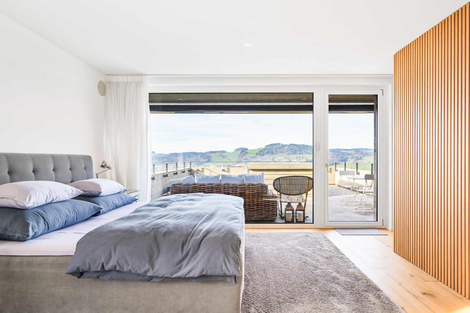 room / bedroom featuring wood finished floors and access to outside