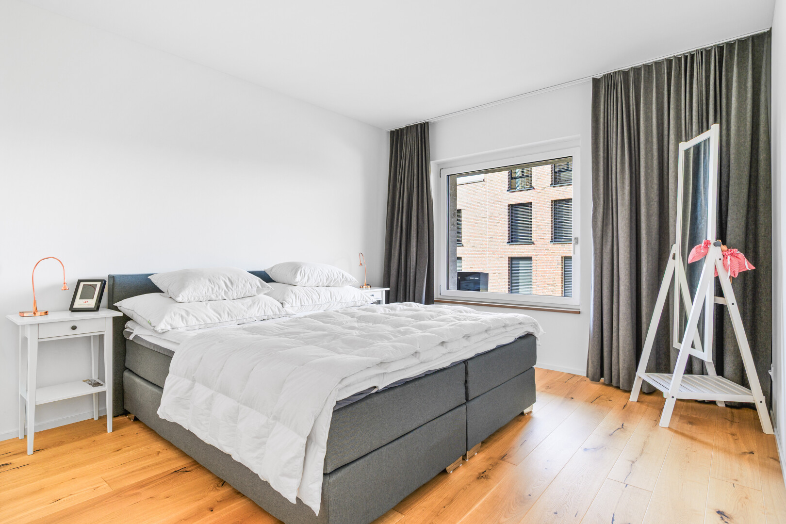 room / bedroom with light wood-style floors