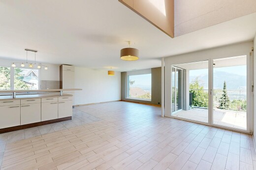 küche mit light floor, light countertops, arbeitsplatten, opens to living area, und öffnet sich zum wohnraum