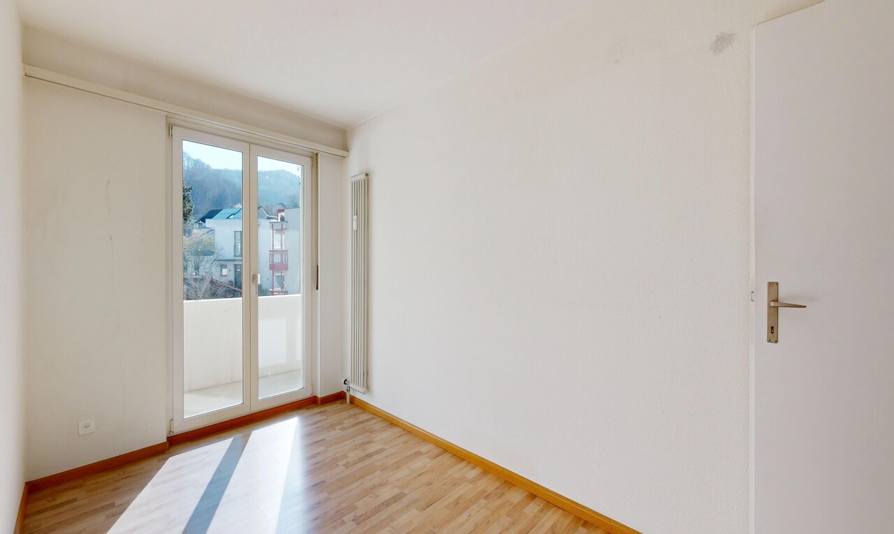 unfurnished room with light wood-style flooring