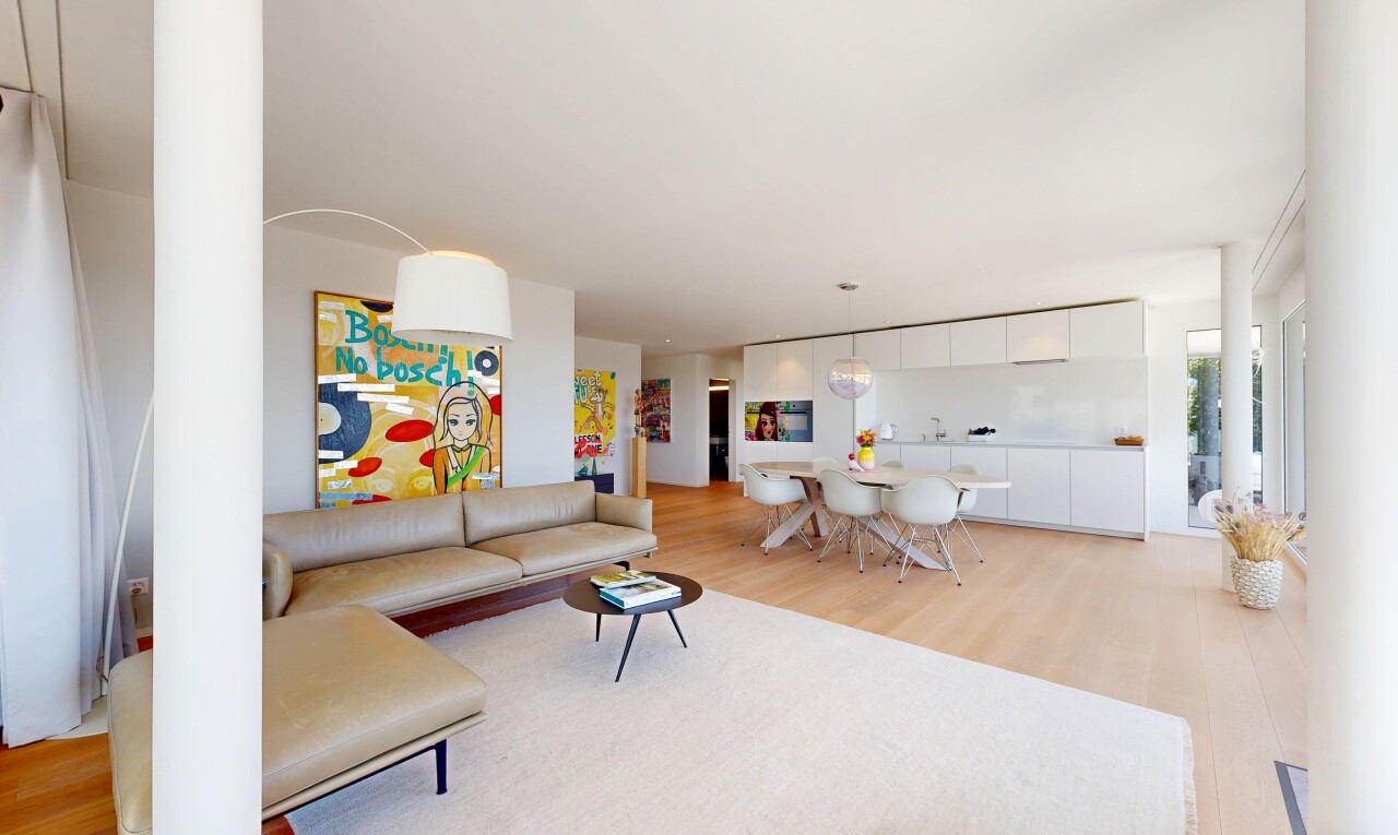 living / dining area with light wood-style floors
