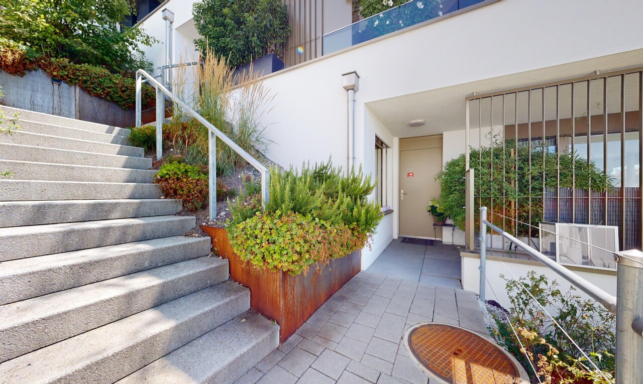 reception area / community lobby featuring stairway