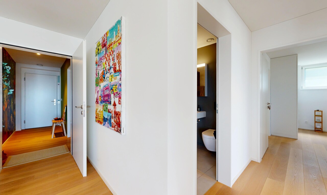 hall with light wood-type flooring
