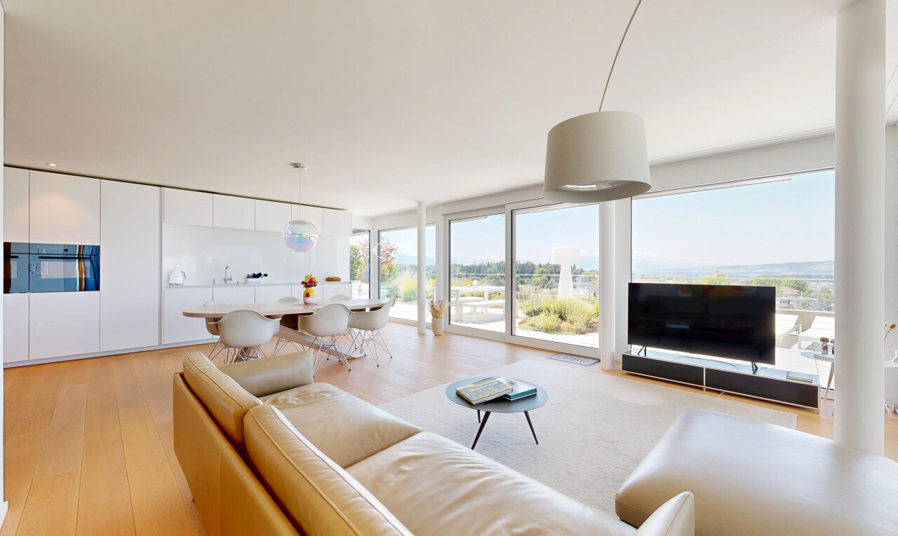 living area featuring pendant lighting and light wood-type flooring
