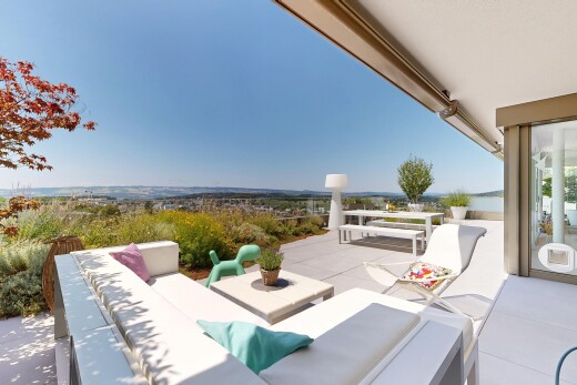 terrace with outdoor seating, a water view, and a patio area