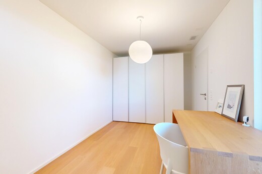 room / bedroom with hanging light fixtures and light wood-style floors