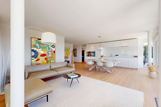 living / dining area with light wood-style floors