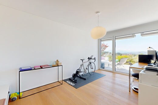 gym featuring light wood finished floors