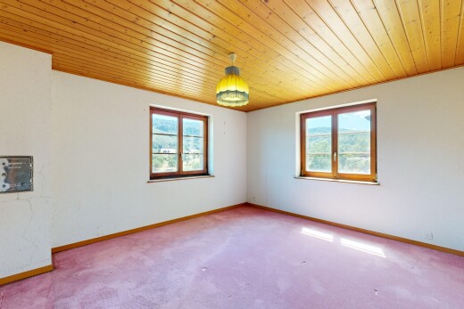 unfurnished room with wood ceiling, carpet flooring, and plenty of natural light