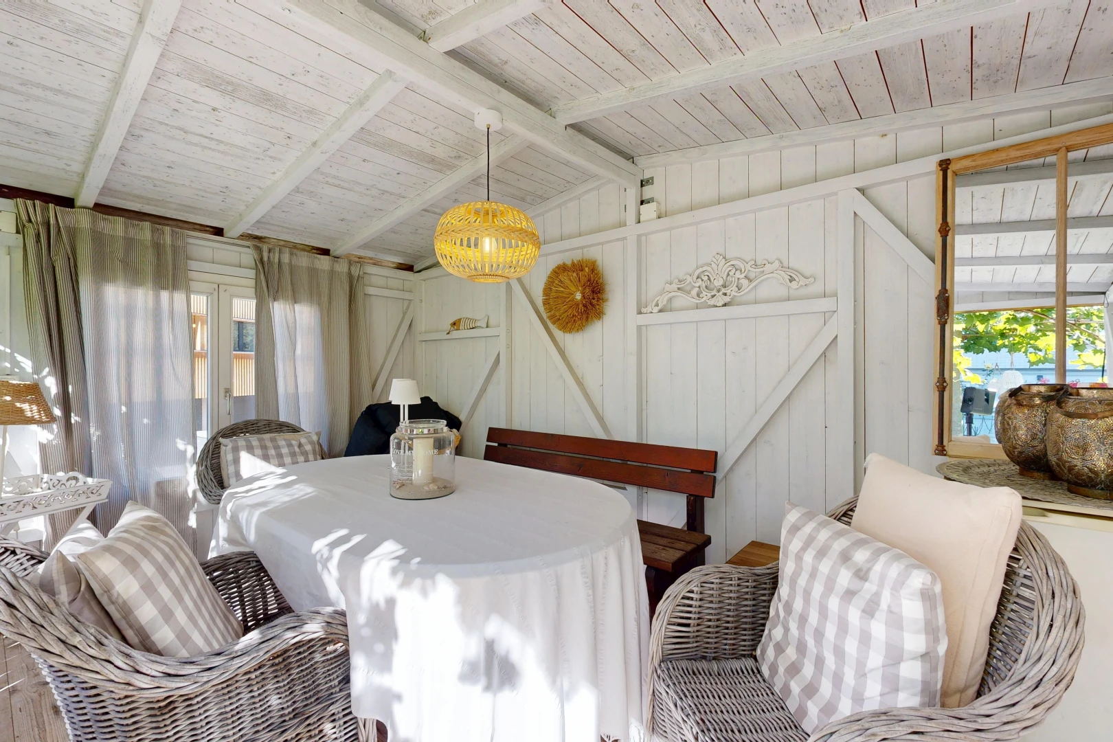 dining area with vaulted ceiling with beams, wooden ceiling, and pendant lighting