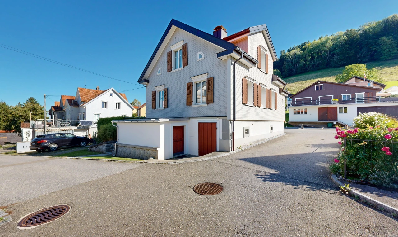 view of home with a chimney