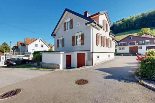 view of home with a chimney