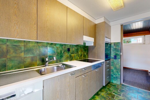 küche mit dark floor, waschbecken, arbeitsplatten, light countertops, und ofen