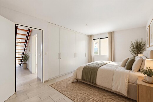 room featuring stairs and a closet