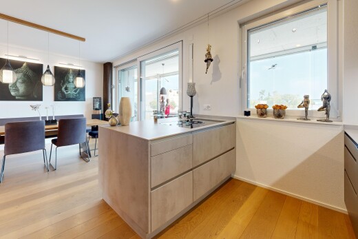 küche mit light floor, wood finish floor, holzfußboden, pendelleuchte, und light countertops
