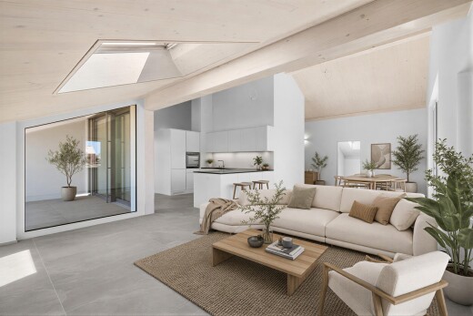 cuisine avec opens to living area, ouvert sur l'espace de vie, vaulted ceiling, plafond voûté, et white cabinets