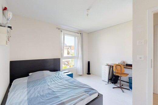 zimmer / schlafzimmer mit natürliches licht, drywall, gipskartonwand, bürobereich, und inside property