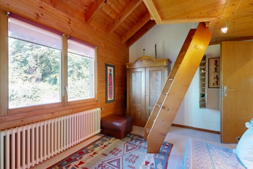 room / bedroom featuring radiator, wood walls, and a high wood beamed ceiling