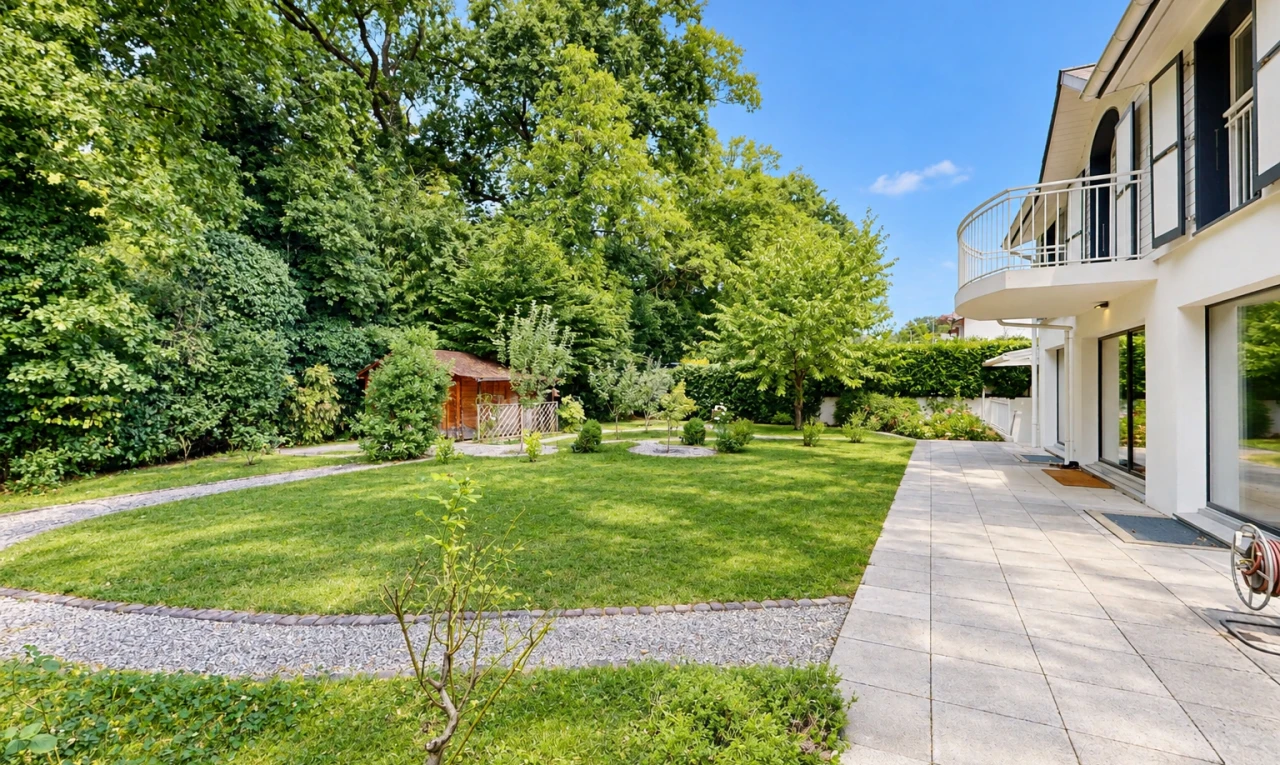 garden featuring a yard and a balcony