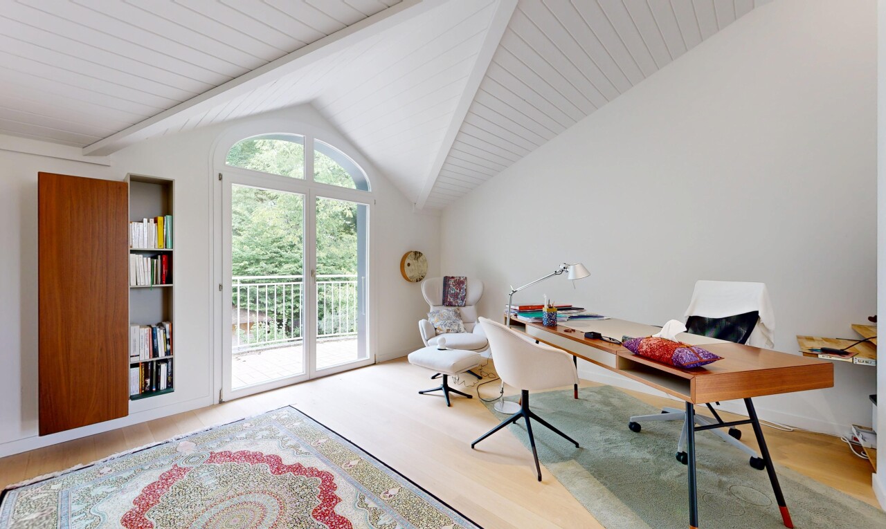office featuring access to outside and lofted ceiling