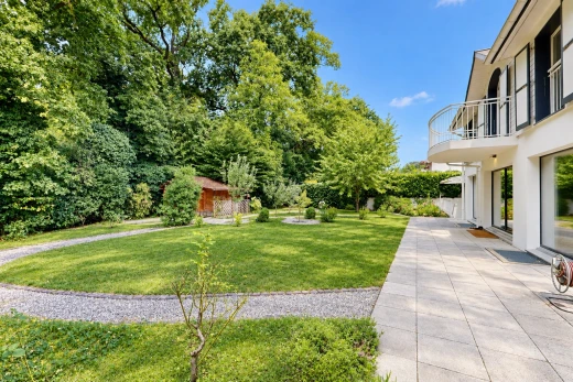 garden featuring a yard and a balcony