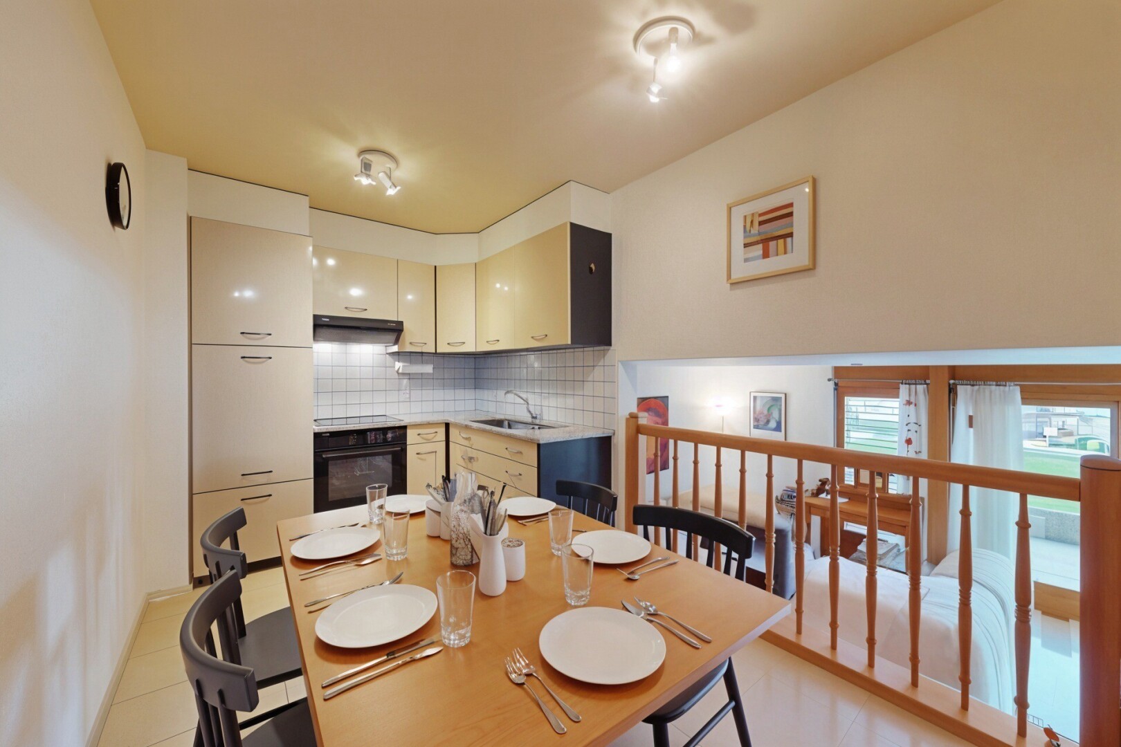 dining area with a sink and baseboards