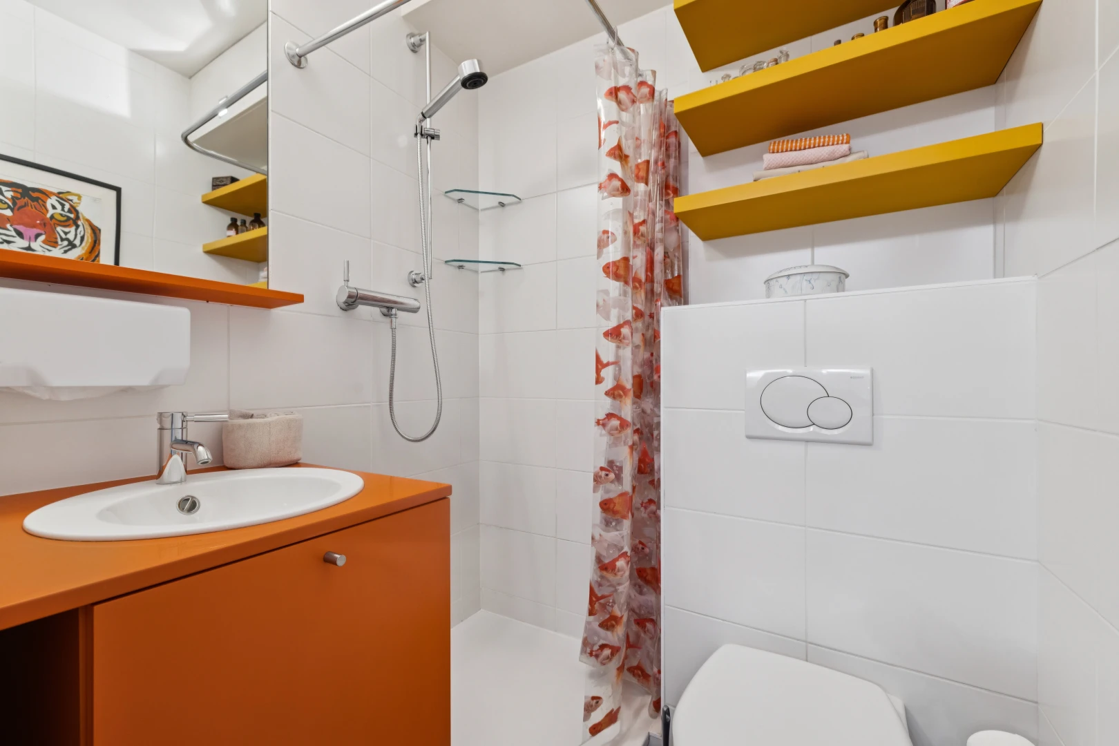 full bath featuring a stall shower, vanity, and tile walls
