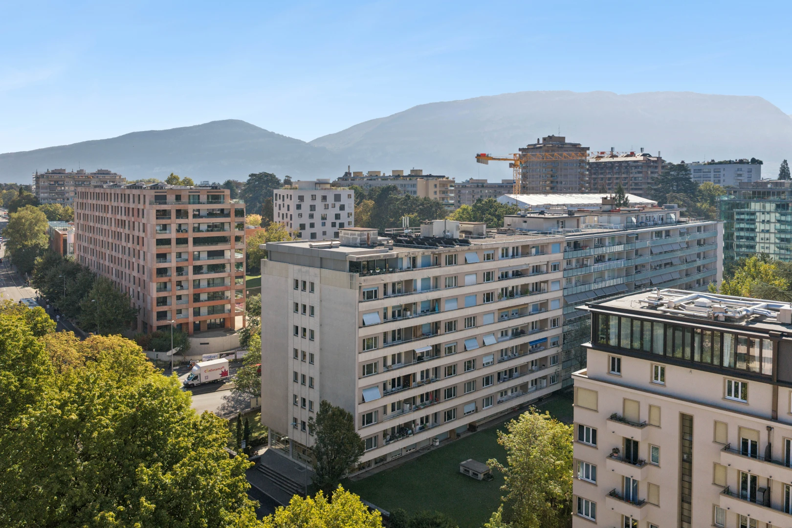 view of apartment building / complex with a mountain view