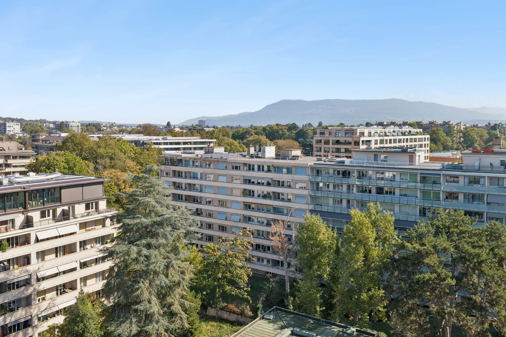 view of apartment building / complex with a mountain view